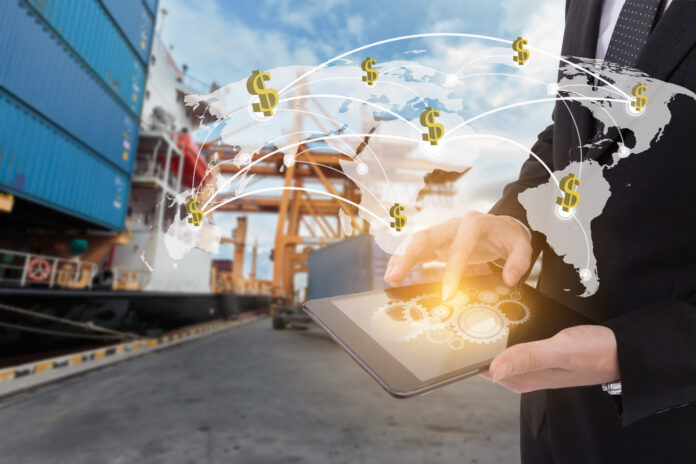 Image of businessman holding tablet ,Finance concept on Global n